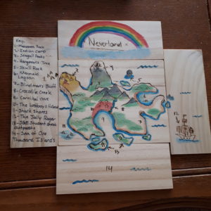 Artwork titled "Map Contest: Neverland (wood-burned and painted)", submitted by MarionWood on April 27, 2020.